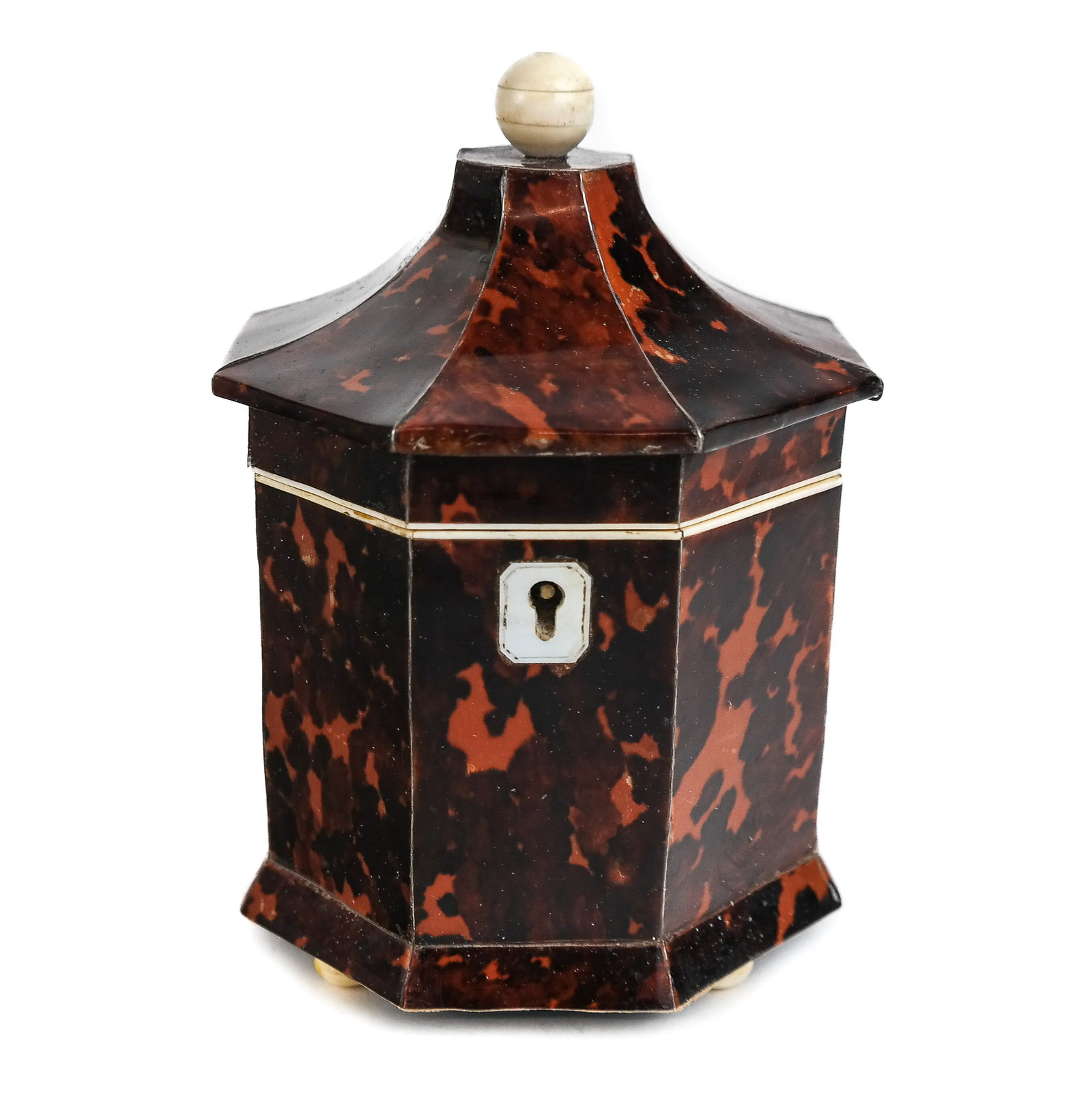 George III Footed Tea Caddy: Decorated footed hinged-top tea caddy, 19th century. [6" H x 4.5" diameter]. Interior replaced with foil, otherwise in good condition. Condition reports and requests for additional photos cannot be ac