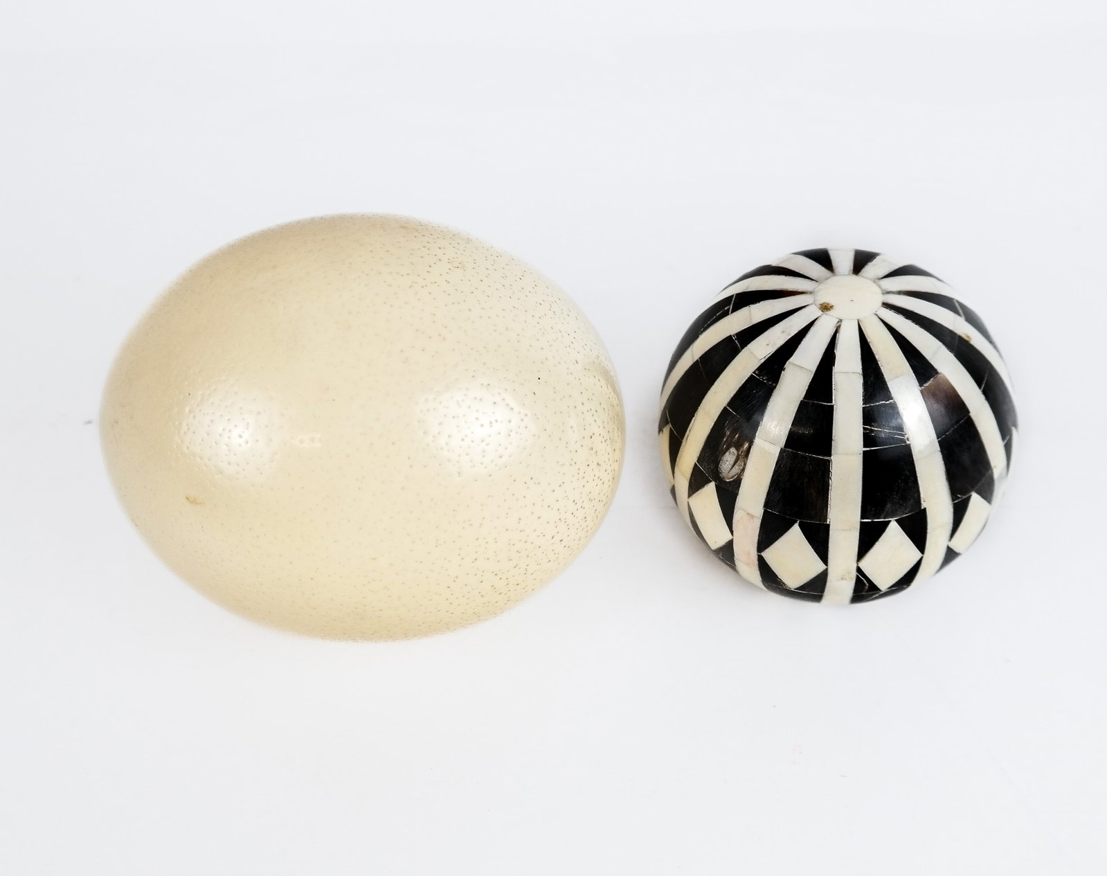 Ostrich Egg and Bone/Horn Ball: Ostrich egg and bone/horn ball. [Larger: 5" diameter]. Both in good condition. Condition reports and requests for additional photos cannot be accepted on this lot; please bid accordingly. This is not 