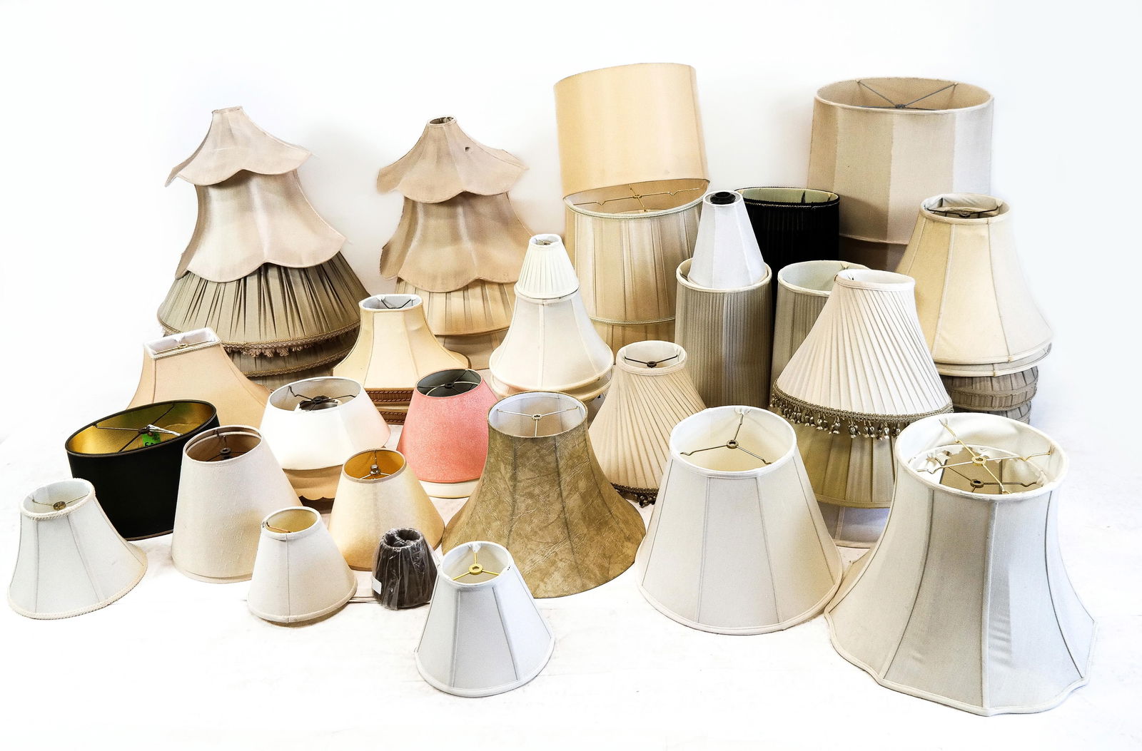 Large Group of Lampshades: A large group of lampshades including neoclassical, Chinoiserie, modern and other a range of sizes including chandelier shades. As is condition.