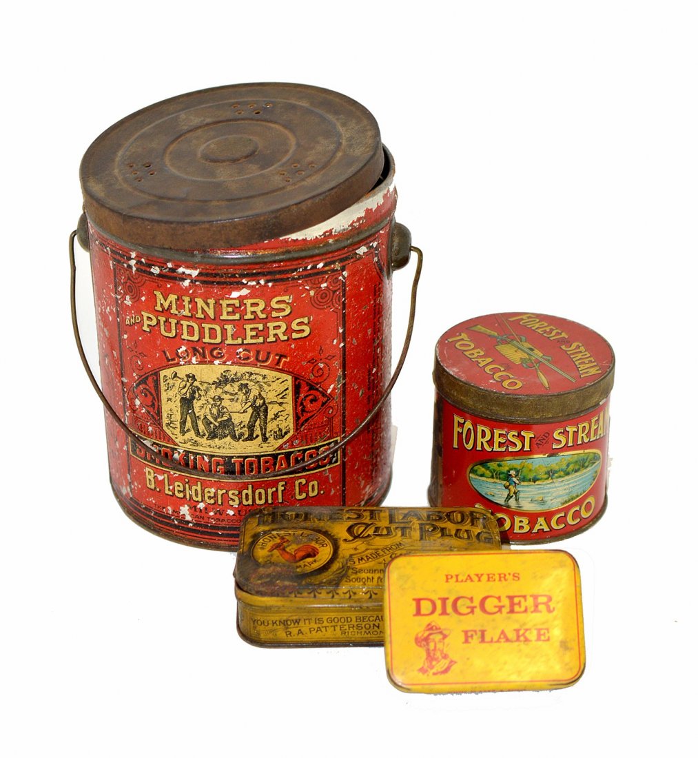 Four Assorted Occupation Tobacco Tins: Comprises: 1.) Miners and Puddlers tobacco tin. Cylindrical with compression lid and bale handle [perforated top]. 2.) Forest and Stream tobacco tin. Cylindrical with compression lid. 3.) Honest Labor
