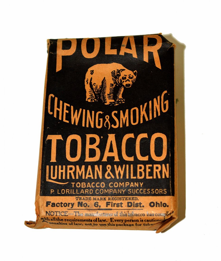 Polar Bear Tobacco Paper Pouch: Printed paper pouch for the Luhrman & Wilbern Tobacco Company. 3 1/2" W x 1 3/8" D x 5" H. Age-toning and wear at edges with short tears at top flaps, otherwise complete.