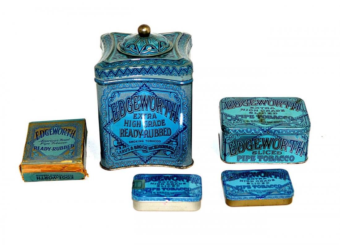 Five Edgeworth Tobacco Tins and Box: All tins hinged with sizes: 3 1/4" x 2 3/8" x 5/8"H; 4 1/2" x 3 1/4" x 2 1/4"; 4 3/4" Sq. x 6 5/8". Box with partially intact tax stamp 3"W x 1"D x 4 1/4". Tins in good condition with minor defects.