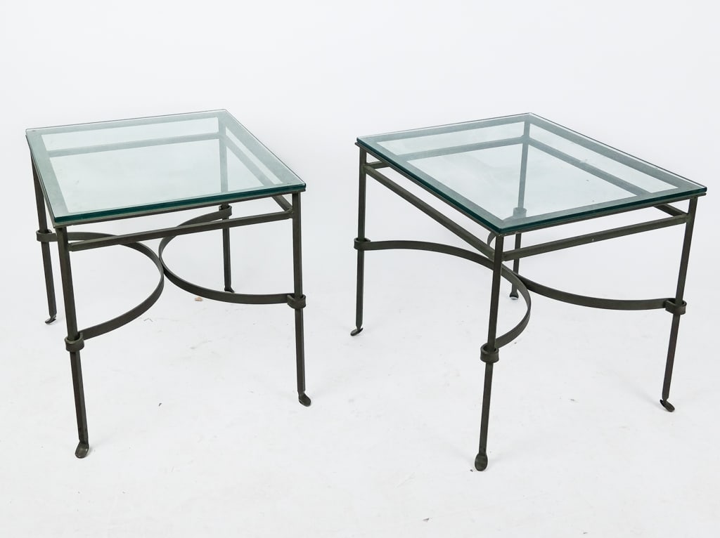 Pair of Steel and Glass Top Tables: Pair of steel and glass top tables, late 20th century, with X-form stretchers and pad feet [24" H x 27" W x22" D] Overall condition is good.