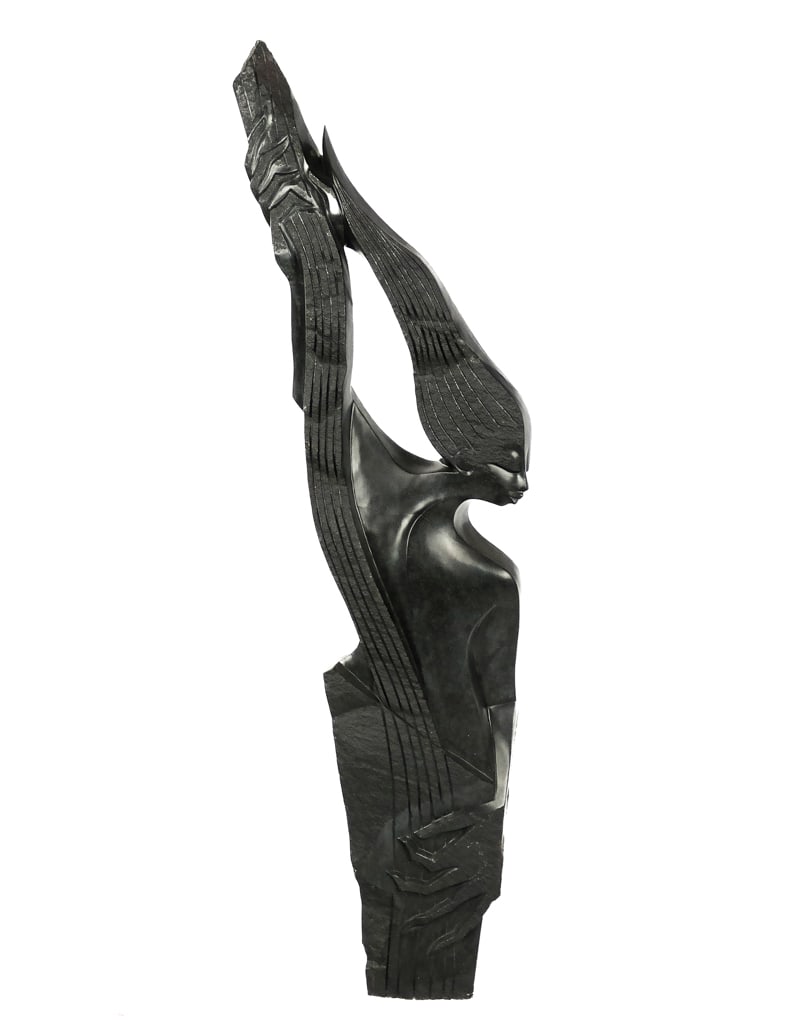 Bonjisi LAMECK Carved Stone Sculpture: Bonjisi Lameck (Zimbabww, 1973 - 2004) carved blackstone sculpture of a woman playing an instrument, signed Bonjisi Lameck to back. [60" H x 16" W x 4" ]. Overall good condition with a lateral crack t