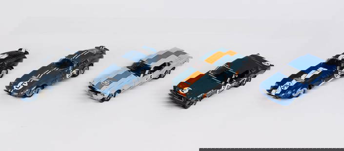 Group of Ford Mustang and Cobra Racecars