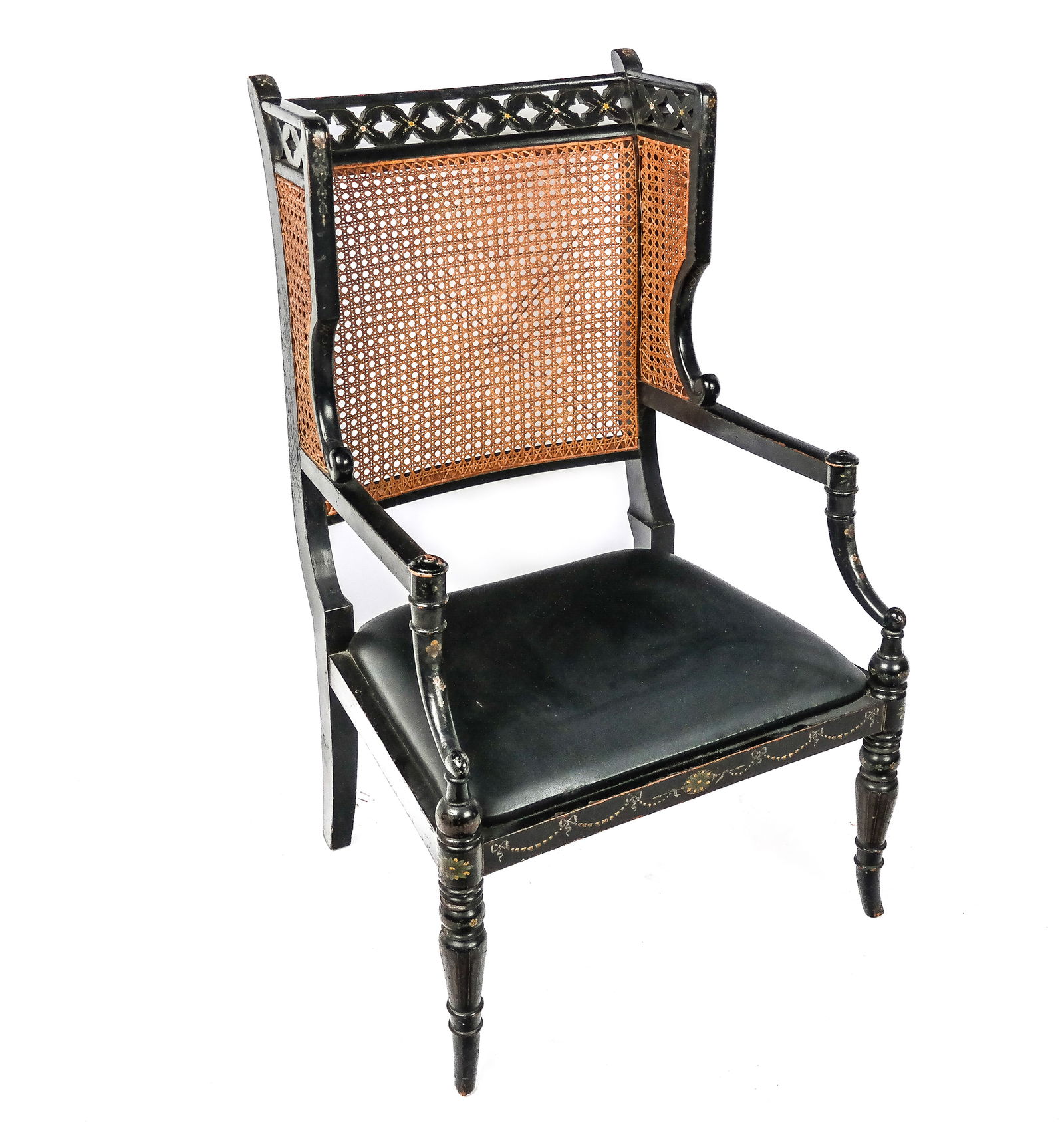 Louis XVI Black Lacquered and Painted Bergere: Louis XVI black lacquered and floral decorated bergere, 19th/20th century, with a decorative pierced wood top over a caned backrest, with carved arms, and a leather seat and fluted decorated legs to f