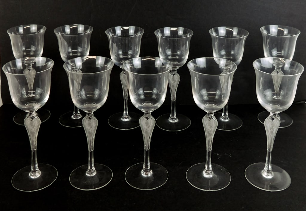 Faberge "Pavlova" Crystal Wine Glasses, 11: Eleven Igor Carl Faberge "Pavlova" crystal wine glasses, 20/21st century, with a frosted figure of a woman at the stem; signed Igor Carl Faberge at base. [8" H x 3.25" Diameter]. Overall condition is 