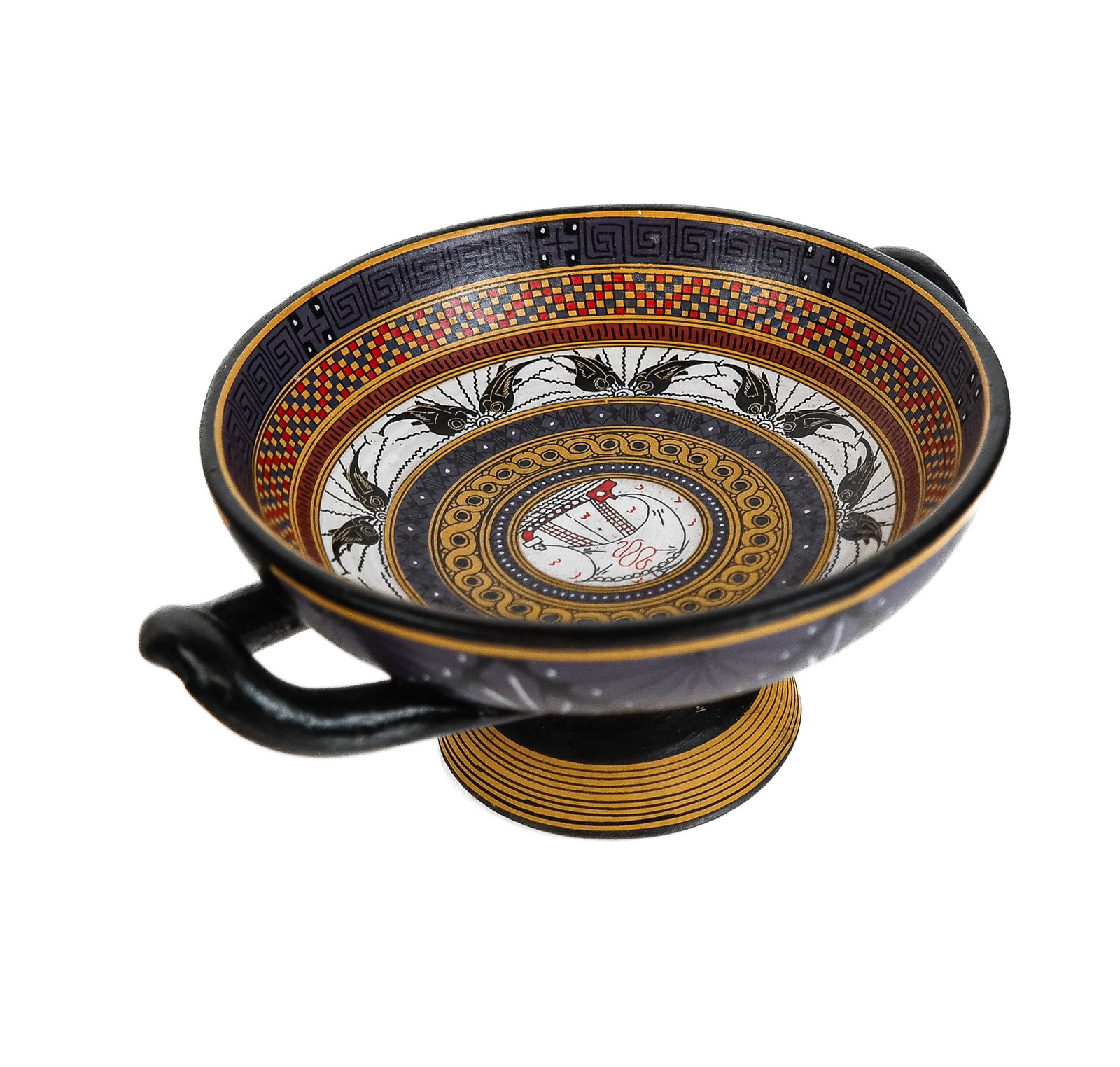 Signed Neoclassical Hand-Painted Kylix: Neoclassical hand-painted kylix, 20/21st century, with a square spiral, dolphin decoration, and central ship, signed "S. Doulac, Olympia WA" at base. [2.25" H x 5.5" W x 4.25" D]. Overall condition is