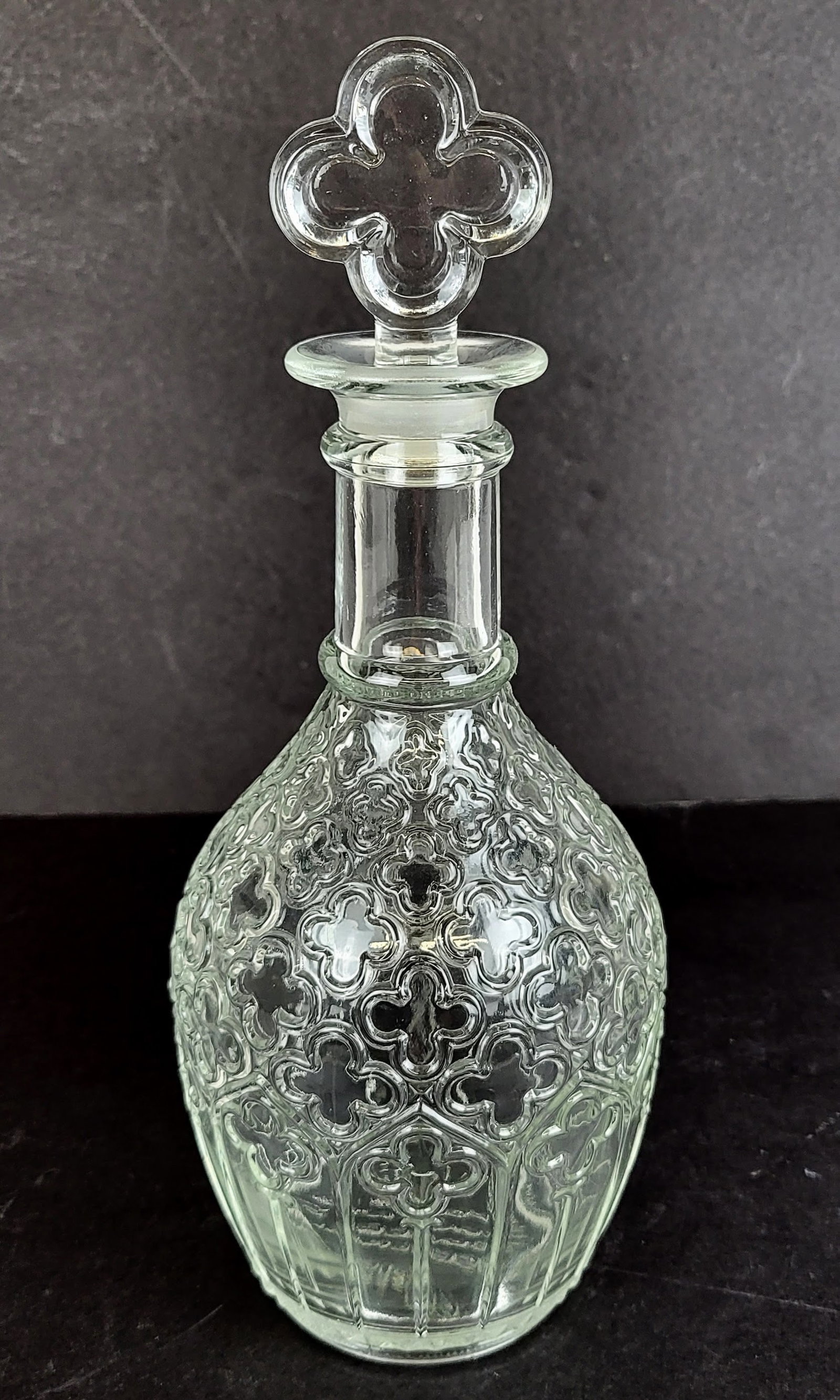 Tiffany & Co. Christian Brothers Decanter: Tiffany & Co. glass decanter designed for the Christian Brothers for their tricentennial with a club design and club form stopper and marked at base. [11.5" H x 4.5" Diameter]. Overall good condition.