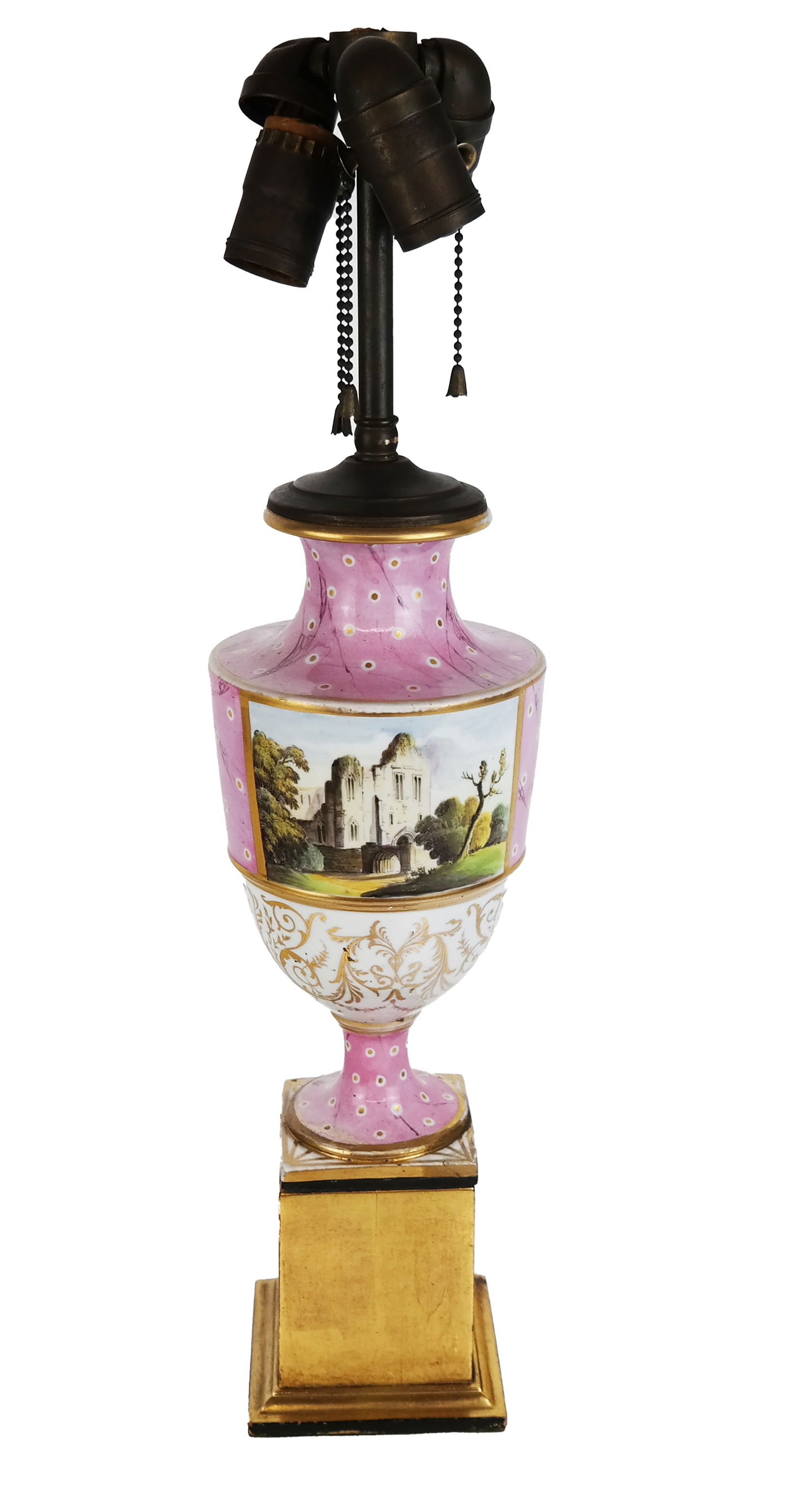 Pink and Gilt Vase Mounted as a Lamp: Vase in the Mintons manner depicting finely detailed buildings in a landscape, with painted reserves and pink and gilt dotted designs with marbleized lines, mounted on a gilt wood plinth. [21" H x 5"