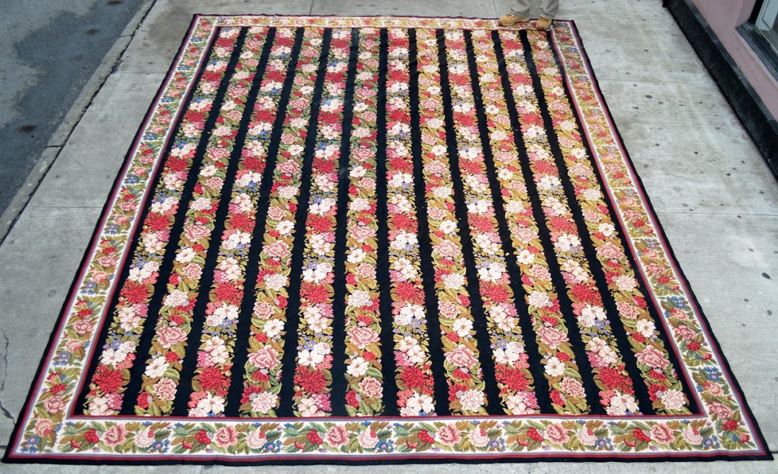 Floral Rug: Floral decorated needlepoint rug. [120" x 155"]