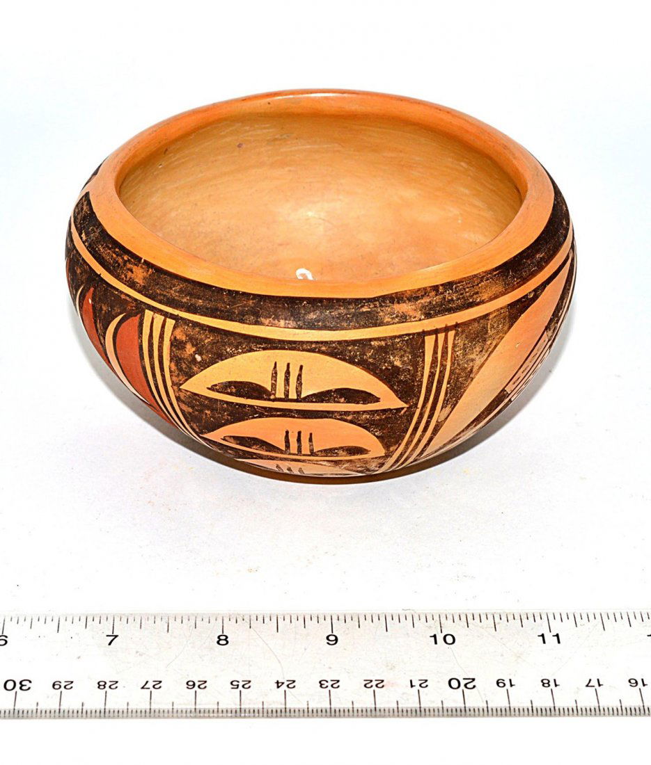 Hopi Pottery Bowl: Earthenware bowl with black and ochre geometric design. 5" Dia x 2 7/8" H. Some wear.