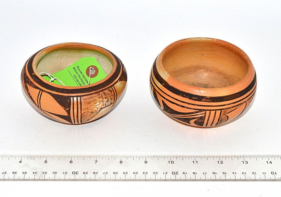 Two Hopi Pottery Bowls: Both earthenware with black geometric designs. One: 4 3/4" Dia x 2 7/8"; the other: 4 5/8" Dia x 2 1/2" H. Some wear.