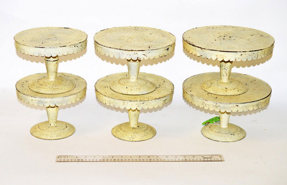 Three Pairs of Vintage Tole Cake Stands: All bear intentional distressed creme finish and scalloped skirt accent. All 6" H with each pair a different diameter. [8 1/4",9 1/4", and 10 1/4"]