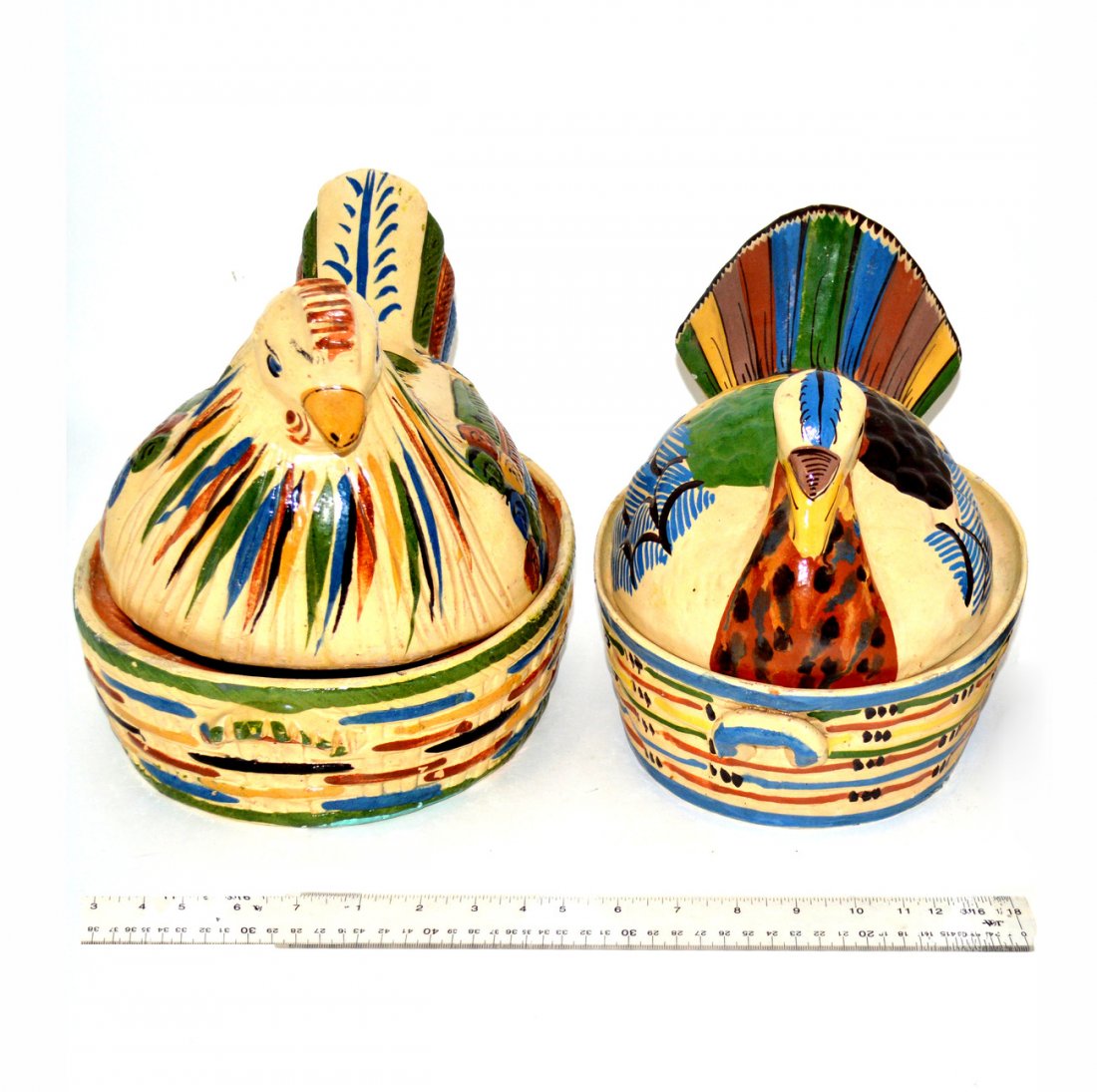 Mexican Glazed Ceramic Hen & Turkey Casseroles: Two whimsical covered casseroles with turkey and hen form lids. Turkey: 10 3/4" W x 8" D x 8 1/2" H. Hen: 12" W x 9" D x 9 1/4" H. Both in good condition.
