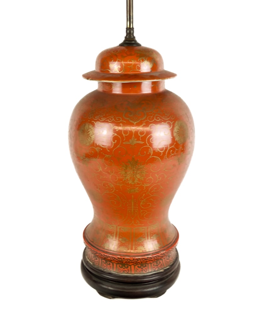 Chinese Orange & Gilt Ginger Jar Mounted as a Lamp: Chinese orange ground and gilt ginger jar, early 20th century, mounted as a lamp with scrolling gilt and foliate decoration throughout, with a matched finial, over an orange painted false base, with a