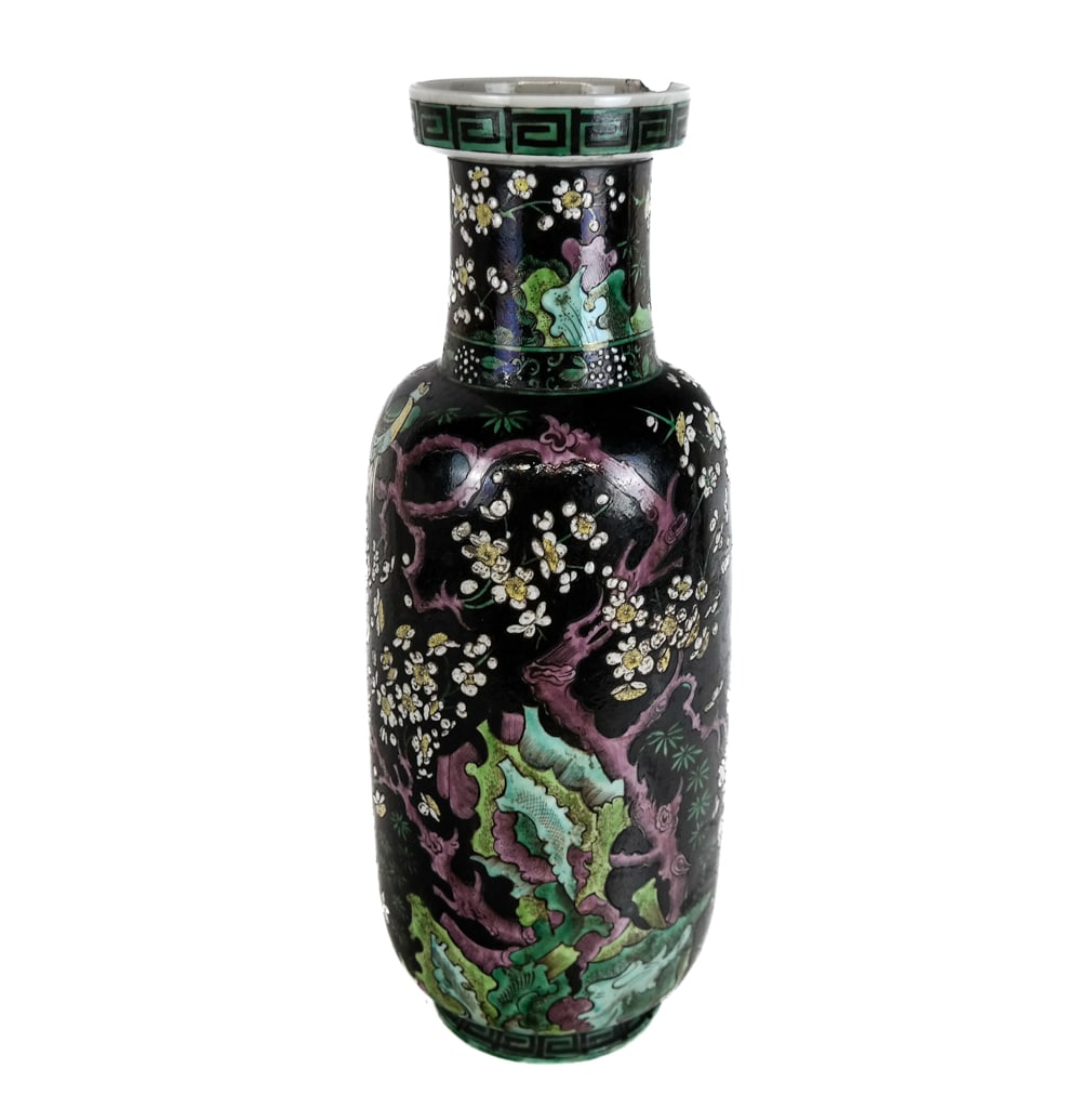 Chinese Famille Noire Vase: Chinese Famille Noire vase, Qing Dynasty, with a square spiral band to lip, over a hand-painted and moriage, foliate, bird, and scholar's rock design. [18.5" H x 7.5" Diameter]. Overall condition is d