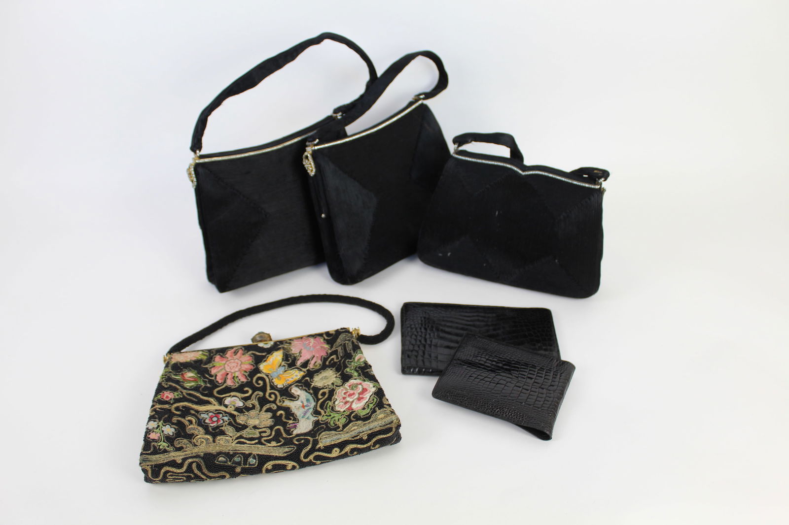 Group of 6 Vintage 1960's Morabito Purses/Wallets: Group of 6 vintage Morabito purses and wallets, circa 1960's, including crocodile, pleated and beaded rhinestone, and embroidered silk with jewel closure. All in good condition as with age. Provenance