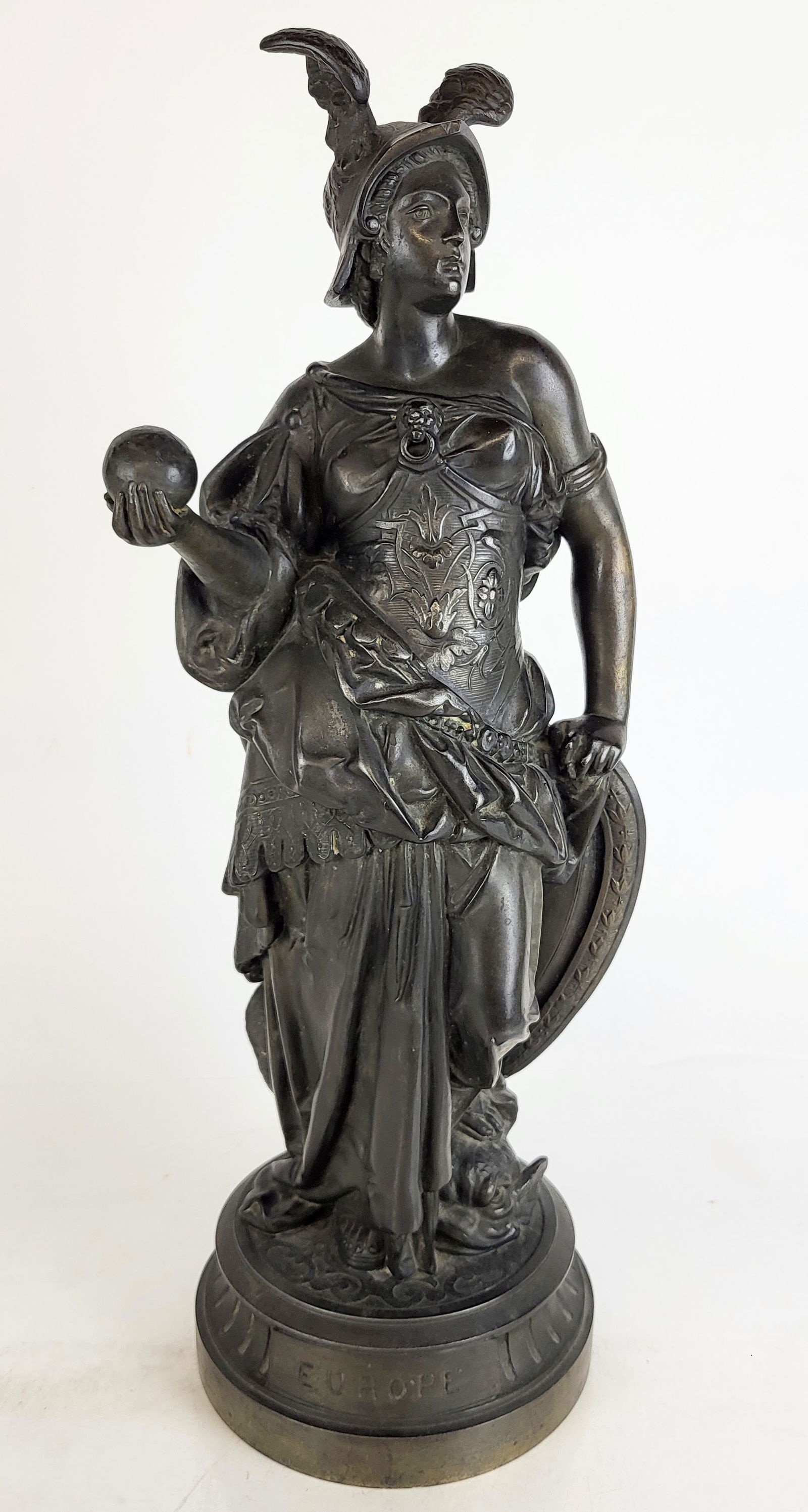 A. Carrier "Europe" Bronze Allegorical Sculpture: Albert-Ernest Carrier-Belleuse (French, 1824-1887) "Europe" patinated bronze sculpture, circa 1880, depicting an armored woman, possibly Roma, wearing a winged helmut and holding an orb and a shield,