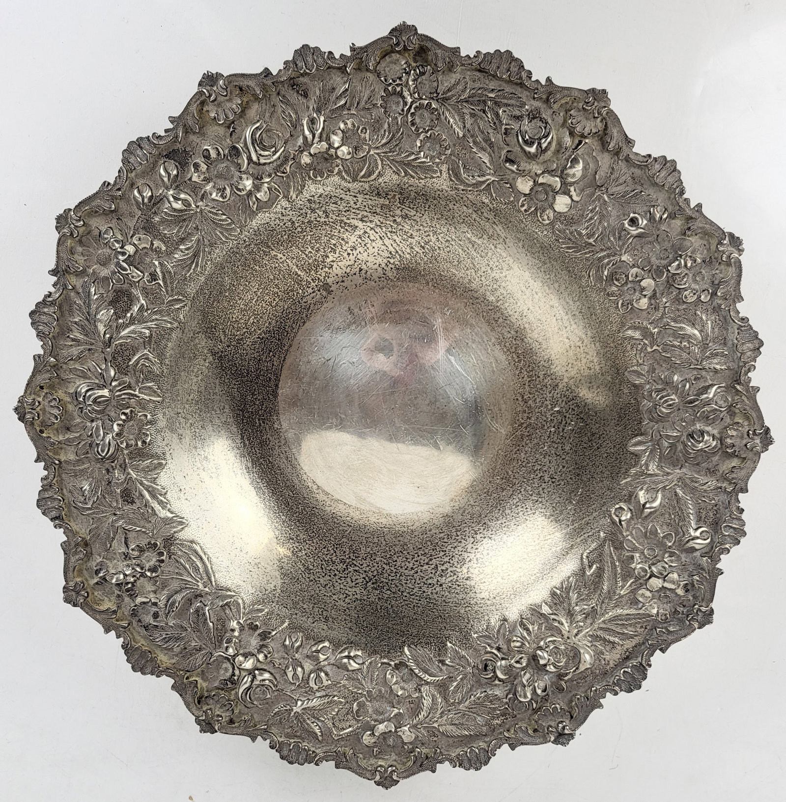 S. Kirk & Son Shallow Bowl: S. Kirk & Son shallow bowl with floral embossed border. 18 ozt. [11" Diameter]. From the esteemed collection of Neil Zukerman former owner CFM Gallery.