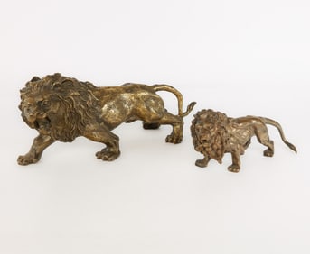 Two Gilt Bronze Lion Sculptures