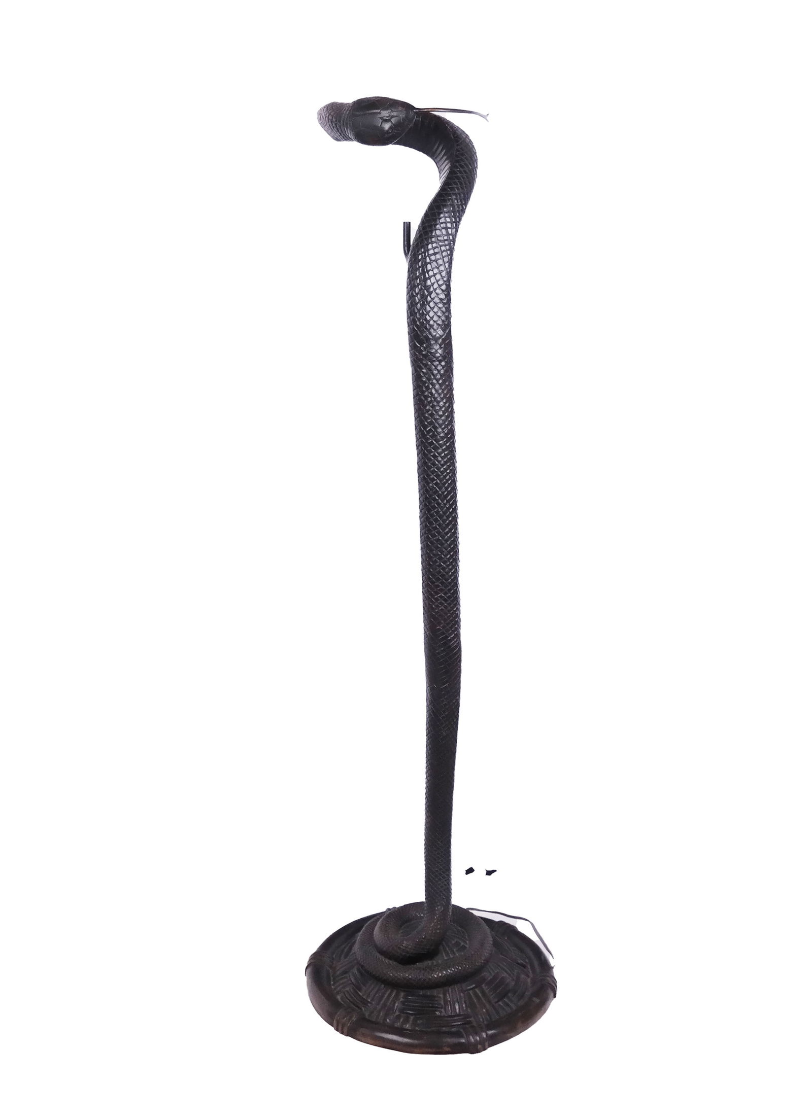 Snake-Form Floor Lamp After Edgar Brandt: Cobra-form floor lamp, after Edgar Brandt, late 20th century. [58" H x 18" Diameter (base)]. In good condition; no cord or shade. From the esteemed collection of Neil Zukerman former owner CFM Gallery