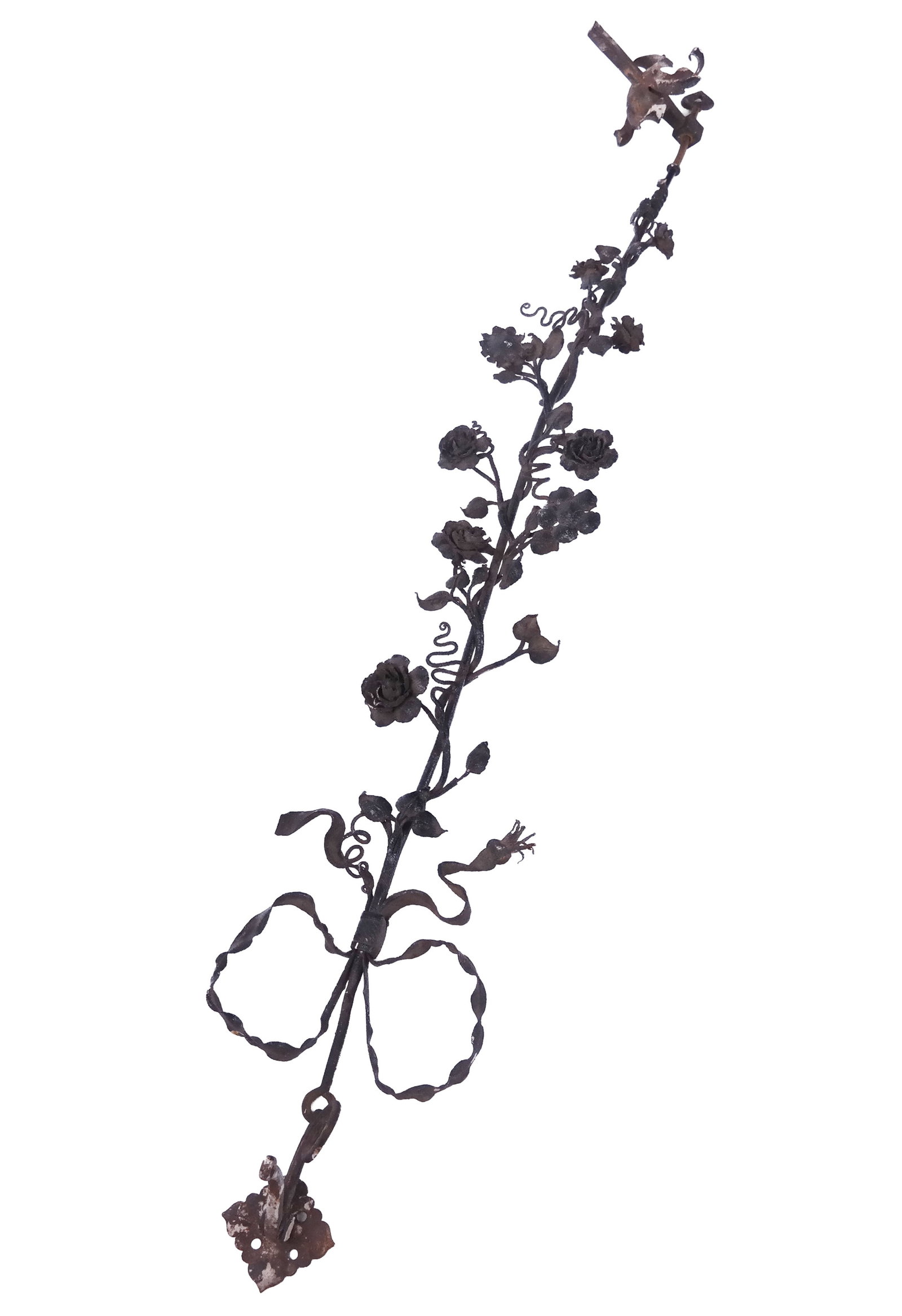 French Tole And Iron Floral Applique: French iron and tole floral wall applique with a ribbon crest, 19th century. [50" H x 8.5" W].