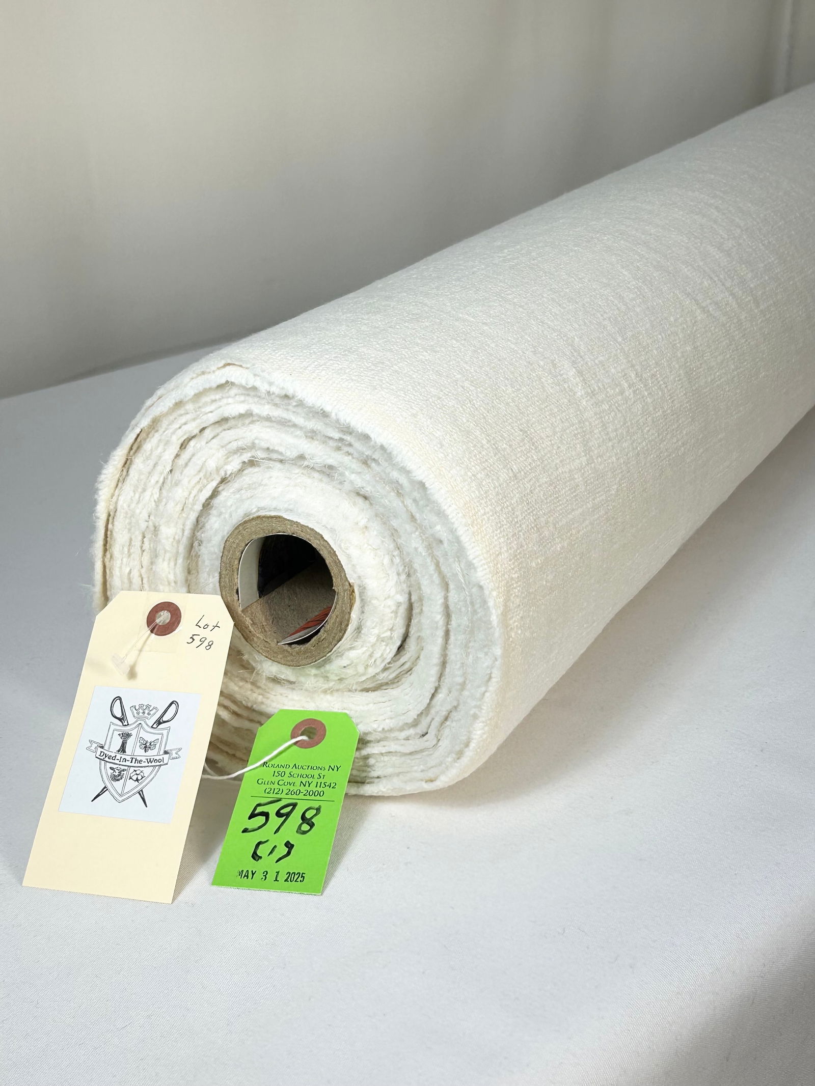 Slubby, Felted Ivory Linen Fabric: 18 yards of an ivory-colored multi-purpose linen texture that has been slightly felted for an added homespun character, 55" width. In excellent condition.