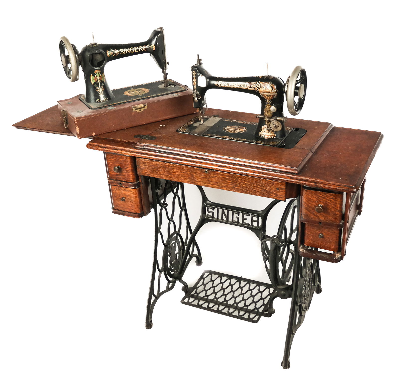 Two Singer Sewing Machines: Two Singer sewing machines, including one with an iron and oak table, Model 12293291, together with a portable machine, without cover, Model H724539; both decorated. [30.5" H x 58" W x 19" D; 12.5" H