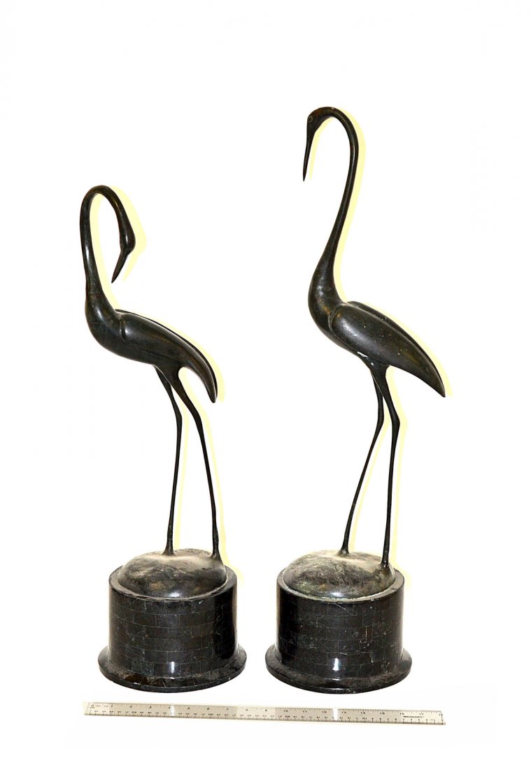 Pair of Maitland Smith Cranes: Pair of reproduction sculptures, cranes on tile form plinths. By Maitland Smith. Good condition. [26" - 30" H]