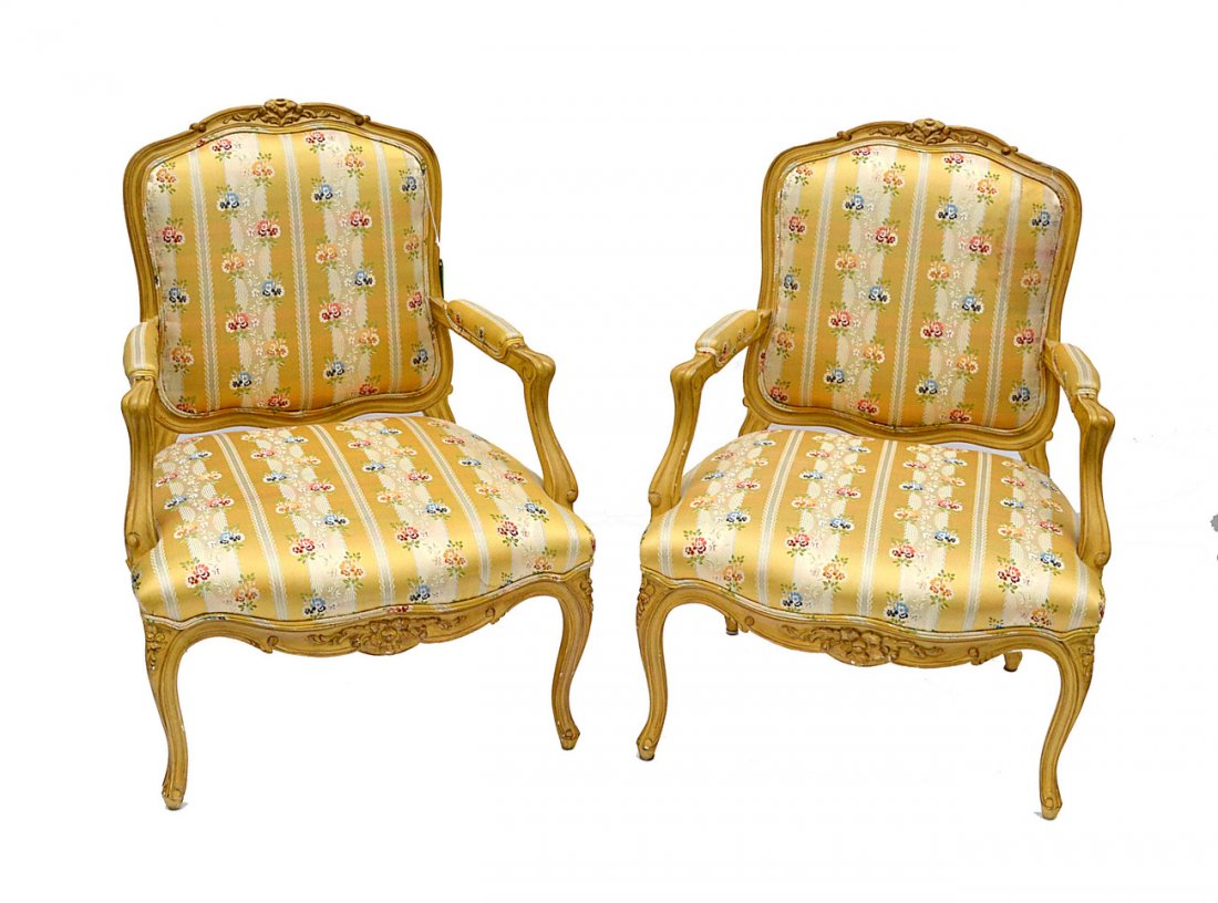 Pair of Louis XV Style Bergeres: Silk upholstered open arm chairs with carved and painted wood frames. Both complete. [29" W x 25" D x 37 4/5" H (17 1/2"H to seat)]
