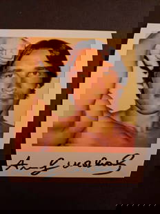 Andy WARHOL Signed Polaroid, Arnold Schwarzenegger: Andy Warhol (American 1928-1987) signed Polaroid of Arnold Schwarzenegger with the artist's signature in blue to lower. [4.5" H x 3.5" W]. Condition is good.