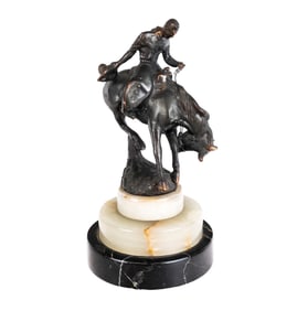 After Remington Bronzed Figure on an Onyx Base