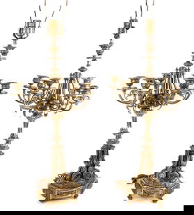 Pair of Louis XVI Gilt Metal Candelabra Lamps: Pair of Louis XVI gilt metal six arm candelabra table lamps, probably mid 20th century, accented with swags, beading and rosettes. [ 28.5" H to socket top x 13" Diameter]. Overall condition is fair,
