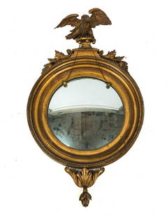 Federal Giltwood Convex Mirror: Federal giltwood convex mirror with eagle surmount, 19th century, the stepped recessed frame with beadwork details accented with acanthus leaves. [39" H x 21.25" W x 6.5" D]. Overall condition is