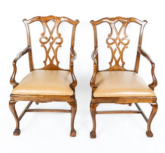 Pair Of Georgian Armchairs: Pair of Georgian-style armchairs with openwork backs on ball-and-claw legs, with brown upholstered slip seats. [38" H x 22.5" W x 22.5" D; 19" H to seat].
