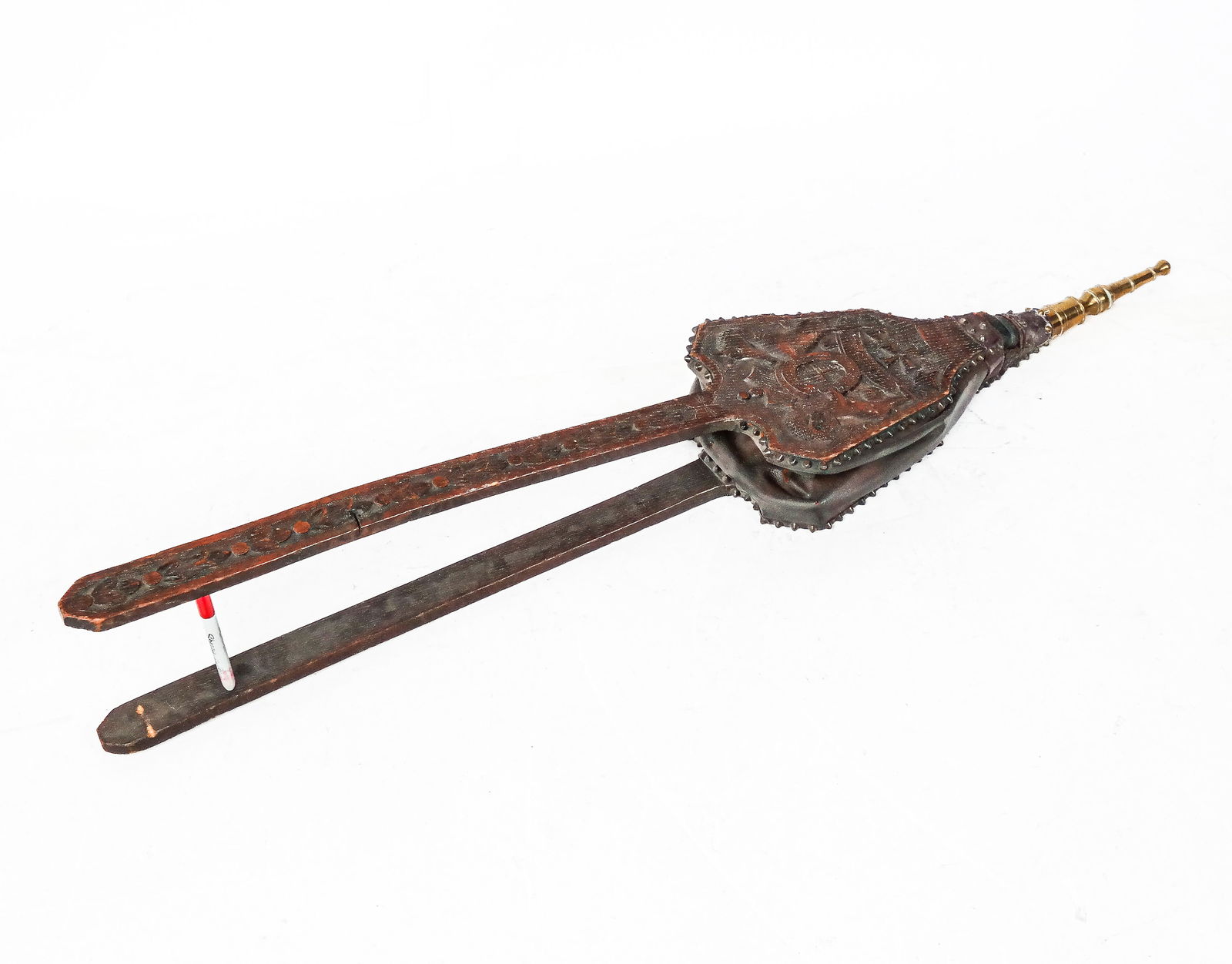 Victorian Oak Bellows: Victorian carved and decorated oak bellows, 19th century. [45" H x 9.5" W x 2" D]. In "as-is" condition; torn. From the Estate of Laura Leonard Ault.