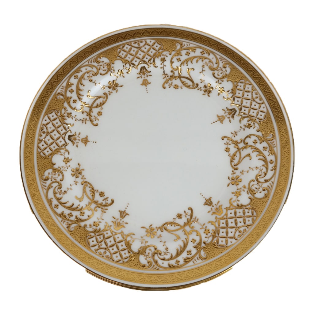Mintons for Caldwell & Co. Salad Plates, 6: Minston for Caldwell & Company six gilt and "jeweled" decorated salad plates, marks to base. [8.75" Diameter]. Overall condition is good for 5 plates, one plate broken in half and repaired.