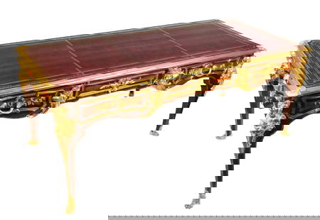After Charles Cressent Important Bureau Plat: After Charles Cressent, Louis XV kingwood and tulipwood, gilt bronze bureau plat, late 19th/early 20th century, the rectangular gilt-tooled leather-inset top with moulded surround and rocaille clasps