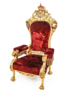 Baroque Gilded and Polychromed Throne Chair: Baroque gilded and polychrome carved throne chair, early 20th century, with suited knight amour decoration, crest with eagle and crown, lion head arms and hairy paw feet, foliage carved throughout, ac