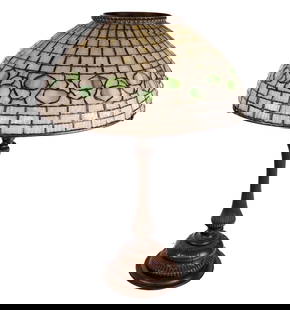 Tiffany Studios Lamp with Leaded Glass Acorn Shade: Tiffany Studios New York Art Nouveau patinated bronze three-light lamp, circa 1905, with leaded glass acorn shade, stamped Tiffany Studios New York to interior shade, and marked Tiffany Studios New Yo