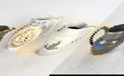 Three Porcelain Pitchers