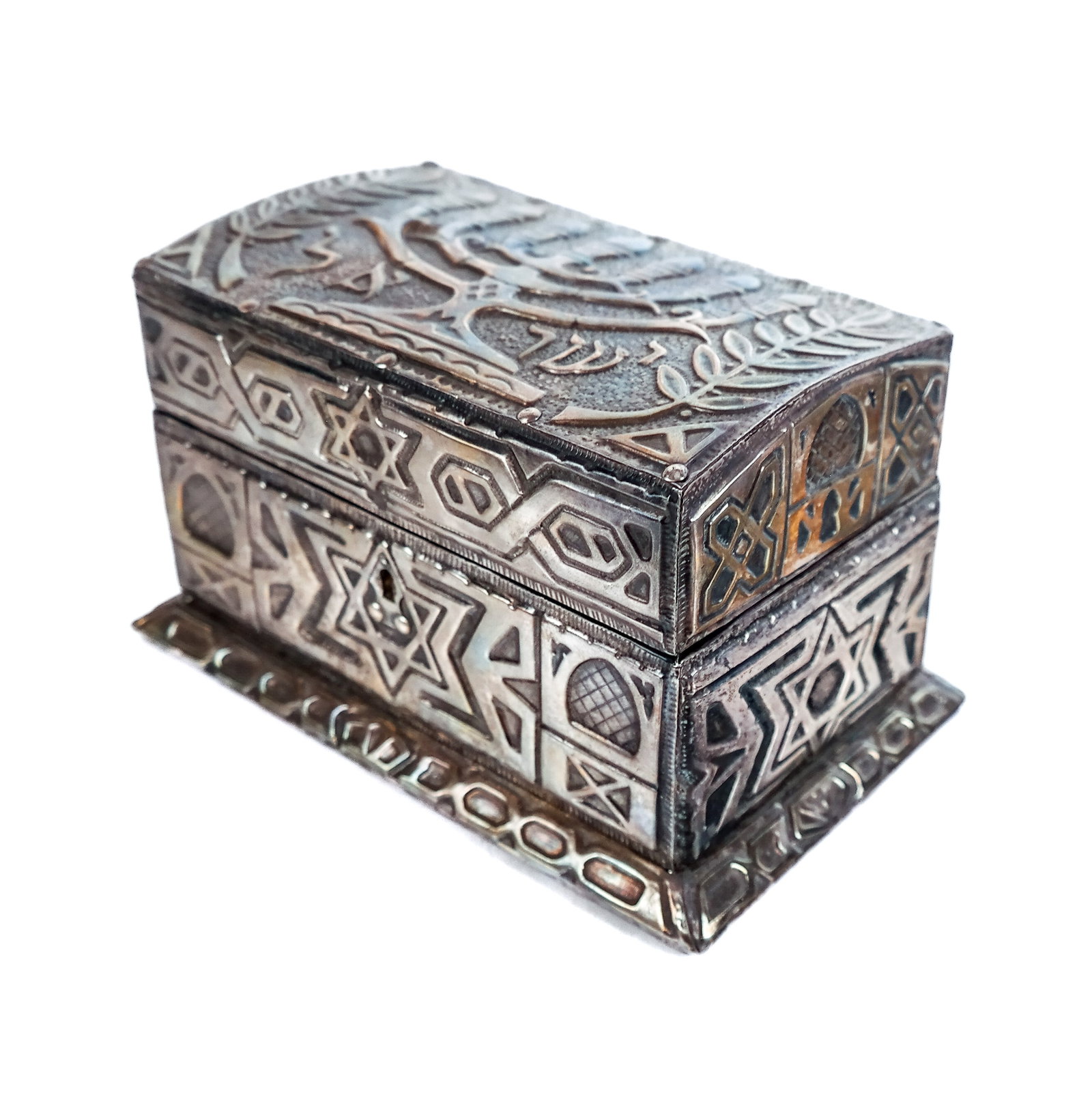 Silver Trinket / Jewelry Box: Silver .999 hand hammered over wood trinket / jewelry box, with lined interior, the lid and body decorated with seven-light menorah, olive branches and six pointed stars, mark to interior lip JB. Plat