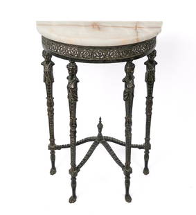 Cast Iron and Onyx Topped Demilune Table: Cast iron and onyx topped demilune table, 20th century, with onyx to upper, over a pierced and decorated frame with figural supports terminating in paw feet. [32" H x 22" W x 10.25" D]. Condition is g