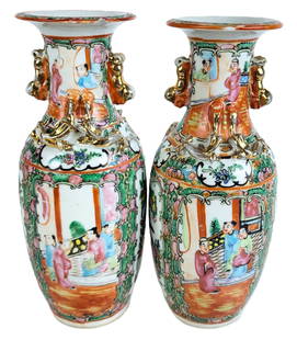 Chinese Pair Famille Rose Vases: Chinese pair Famille Rose vases, early 20th century, with gilt decoration to handles, and foliate framed figural cartouches, unmarked. [10" H x 5" Diameter]. Condition is good with a chip to the lower