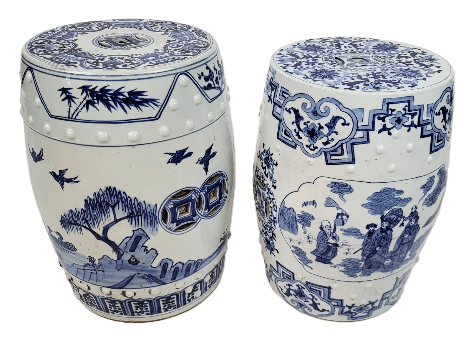 Chinese Near Pair Blue and White Garden Seats: Chinese near pair blue and white Qinghua decorated garden seats, with hand-painted and pierced decoration. [Larger: 19" H x 14" Diameter]. Condition is good with light wear.