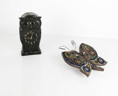 Owl Clock And Butterfly: Arts & Crafts carved owl clock with "ticking" eyes, together with a mosaic mounted wood wall butterfly. [Clock: 10" H; Butterfly: 11" H x 9.5" W]. From the Collection of Susan and Cliff Freeman. Clock