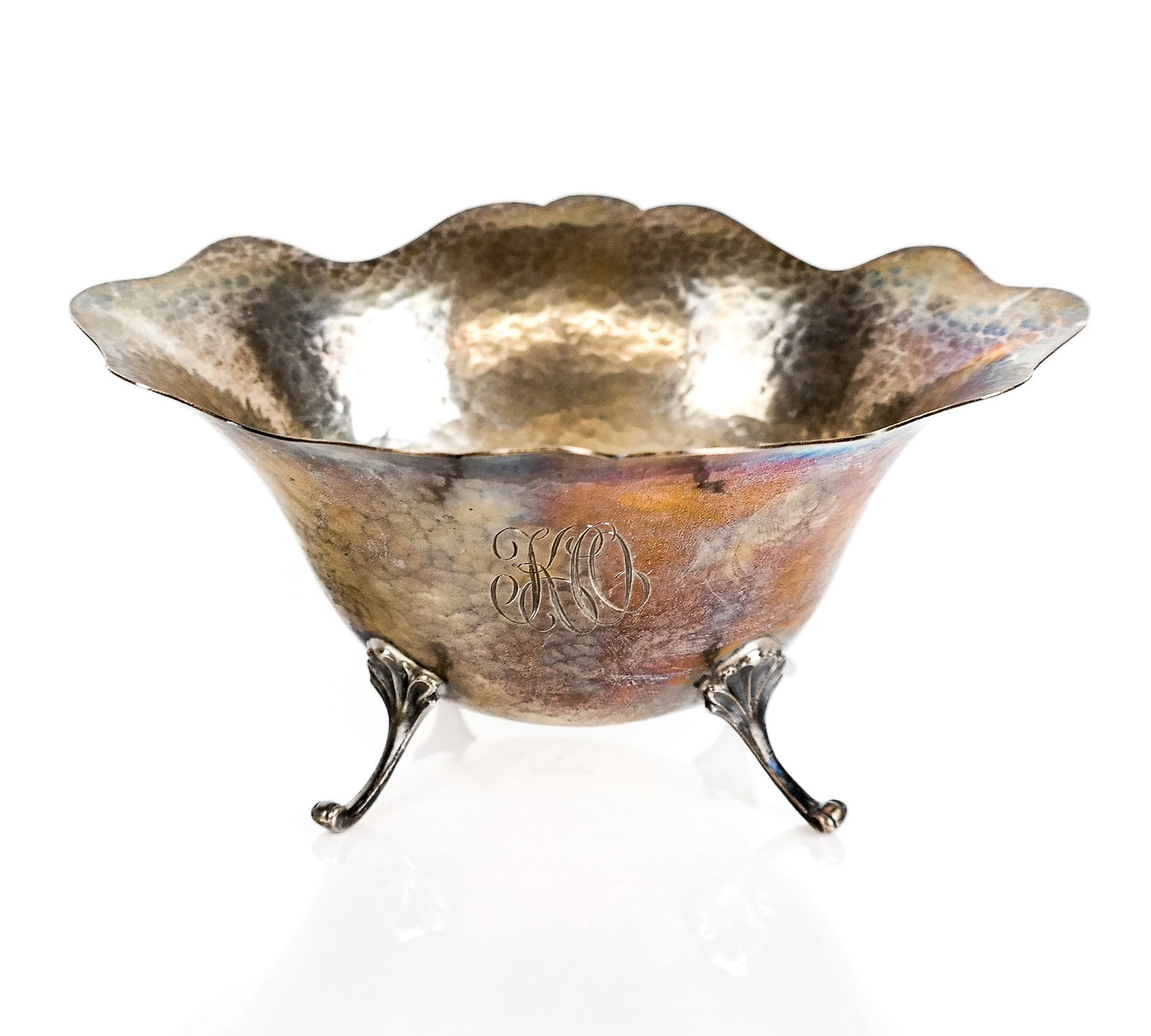 Gorham Sterling silver Hand-Hammered Bowl: Gorham sterling silver hand-hammered bowl resting on carved legs, 1913, monogrammed, marks to base. [5 ozt., 3" H x 6.25" L x 5" W. Overall condition is good. From a New York City Collection.