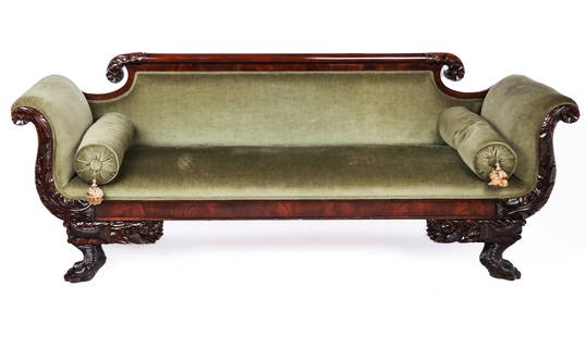 Empire Carved Mahogany Settee: Empire carved mahogany upholstered settee, late 19th century, heavily carved with acanthus leaves and hairy paw feet. [32" H x 80" L x 24" D, 15" Height to seat]. Overall condition is good.