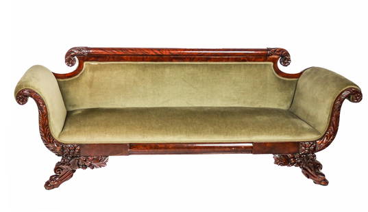 Empire Carved Mahogany Settee: Empire carved mahogany upholstered settee, late 19th century, heavily carved with acanthus leaves and hairy paw feet. [32" H x 80" L x 24" D, 15" Height to seat]. Overall condition is good.